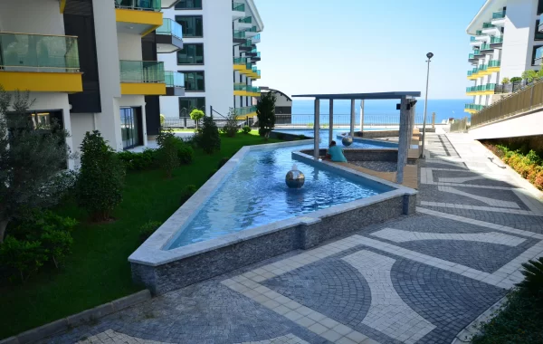 Decorative apartments for sale in Kargicak, a region that is admired and surrounded by scenic views