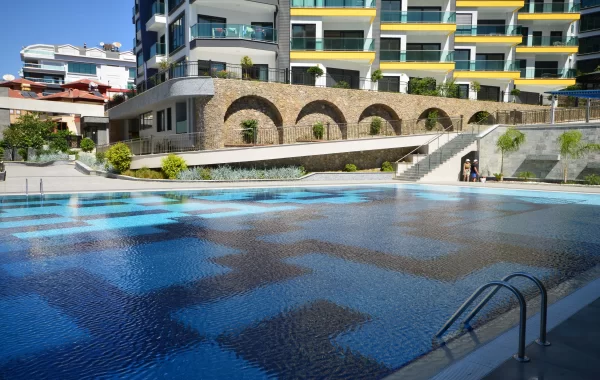 Decorative apartments for sale in Kargicak, a region that is admired and surrounded by scenic views