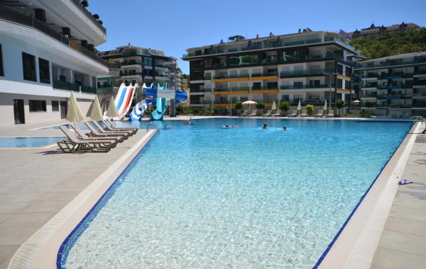 Decorative apartments for sale in Kargicak, a region that is admired and surrounded by scenic views