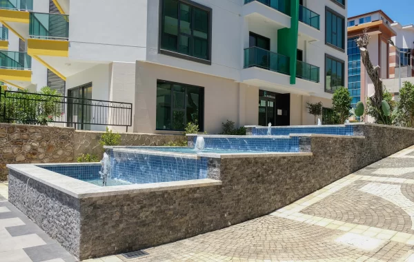 Decorative apartments for sale in Kargicak, a region that is admired and surrounded by scenic views